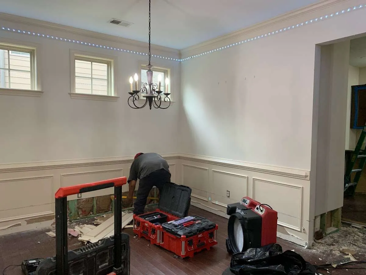 Restoration technician with professional equipment in Union